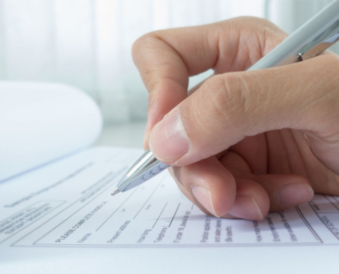 screening Hand with pen over application for 1 screening Hand with pen over application for 1